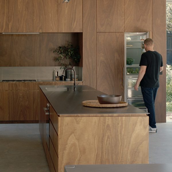 Timber kitchen featuring appliances by Fisher & Paykel