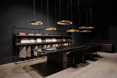 Lights above a table in the Henge showroom