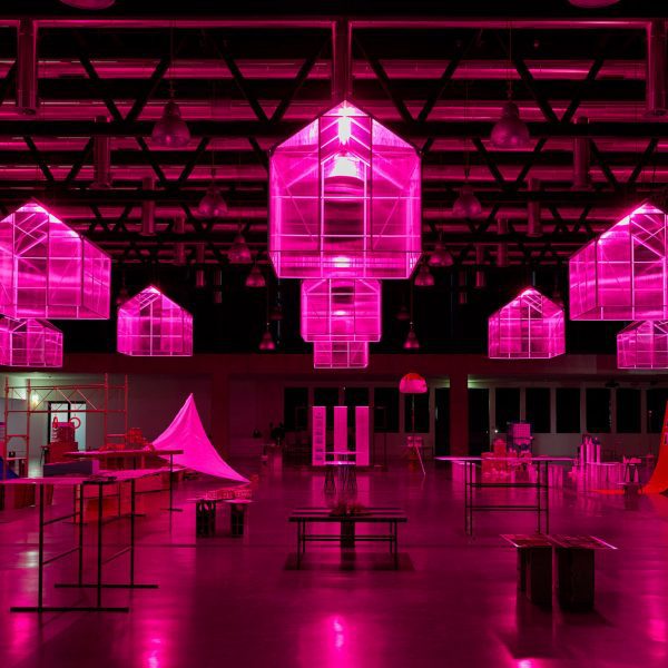 A photograph of an installation in tones of pink