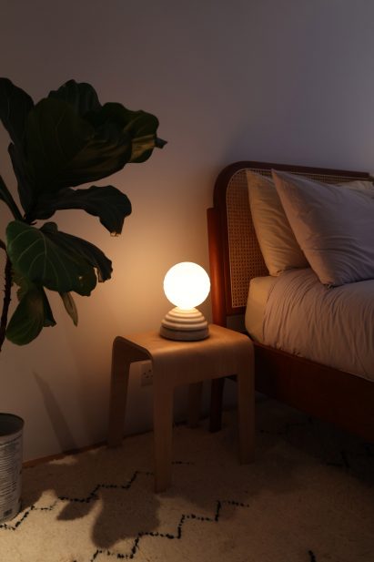 A Wake sleep lamp in a bedroom