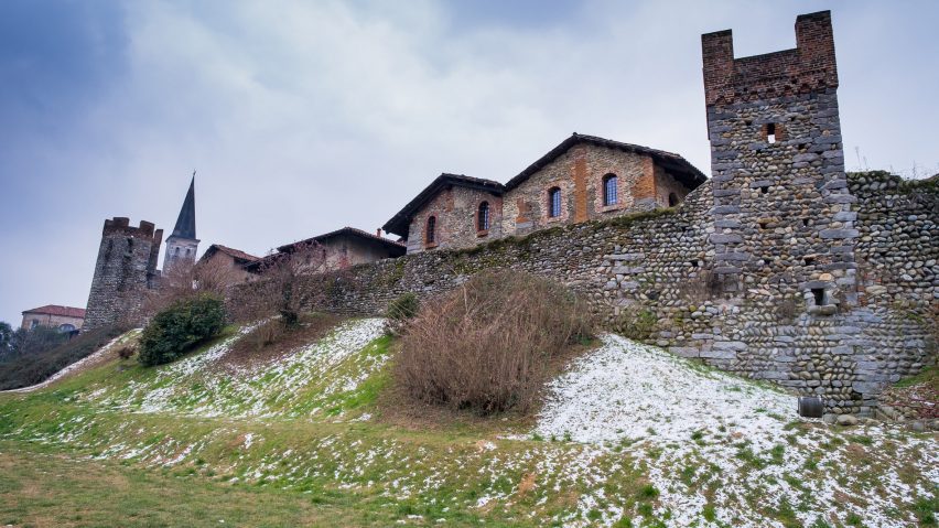 Historic buildings on a hillside in Italy