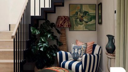 Photo of stairwell with furniture underneath