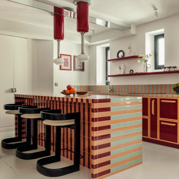 Kitchen with striped, tiled island and counters