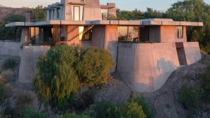 OF Studio designs Argentinian mountain house that “emerges from the terrain”