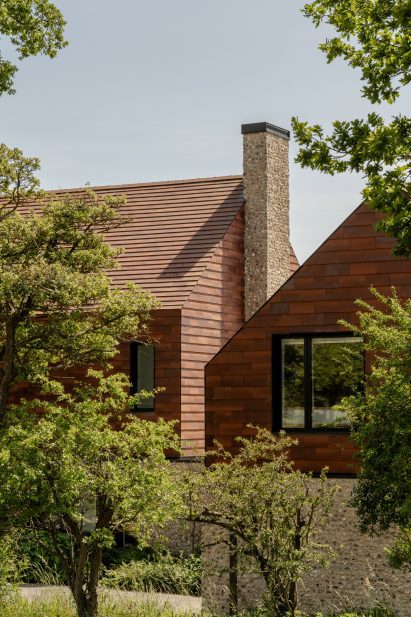 Clay tile facade of Bulls Barn house by Selencky Parsons