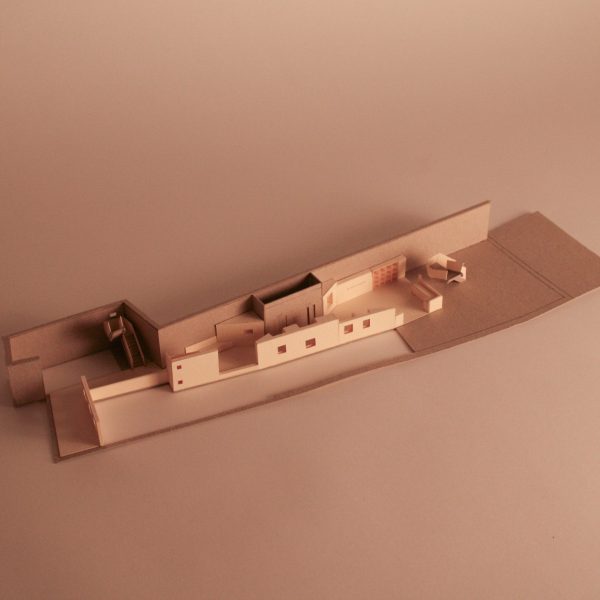 a photograph of an architectural model in tones of beige