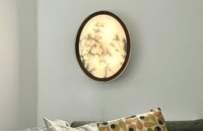 a photograph of a circular wall light