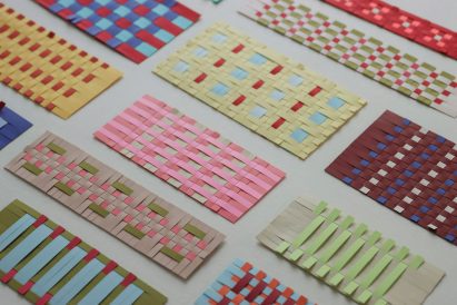 a photograph of sheets of woven paper