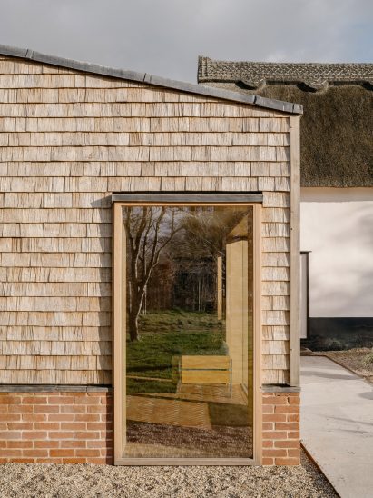 Exterior of a shingle-clad extension in Suffolk