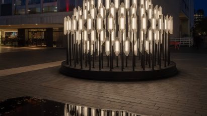 Glass beacon reflcted in water