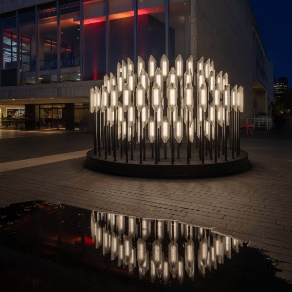 Glass beacon reflcted in water