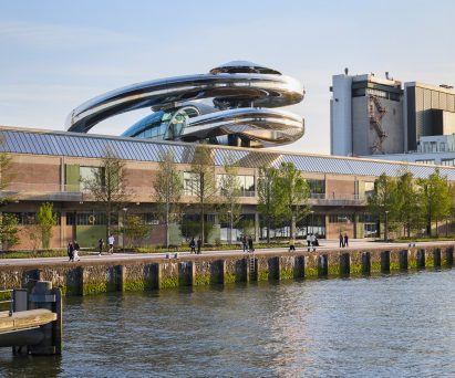 Exterior view of the Fenix Museum of Migration with mirrored spiral form