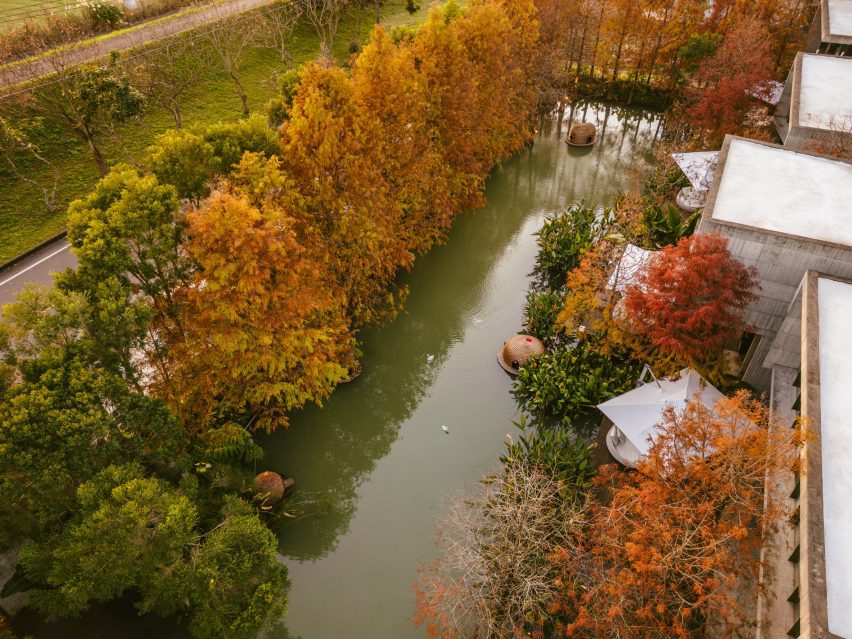 Aerial shot of duck houses floating on pond