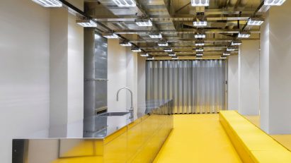 Fashion store with yellow resin floor