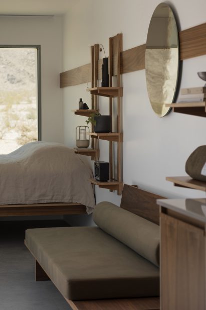 Container outfitted with simple wooden furniture