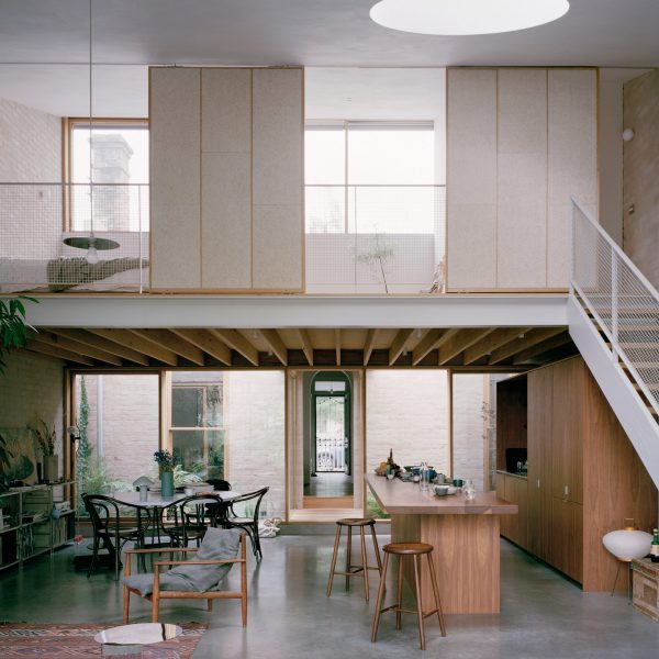 Cottage extension in Australia with sliding walls by Lovell Burton