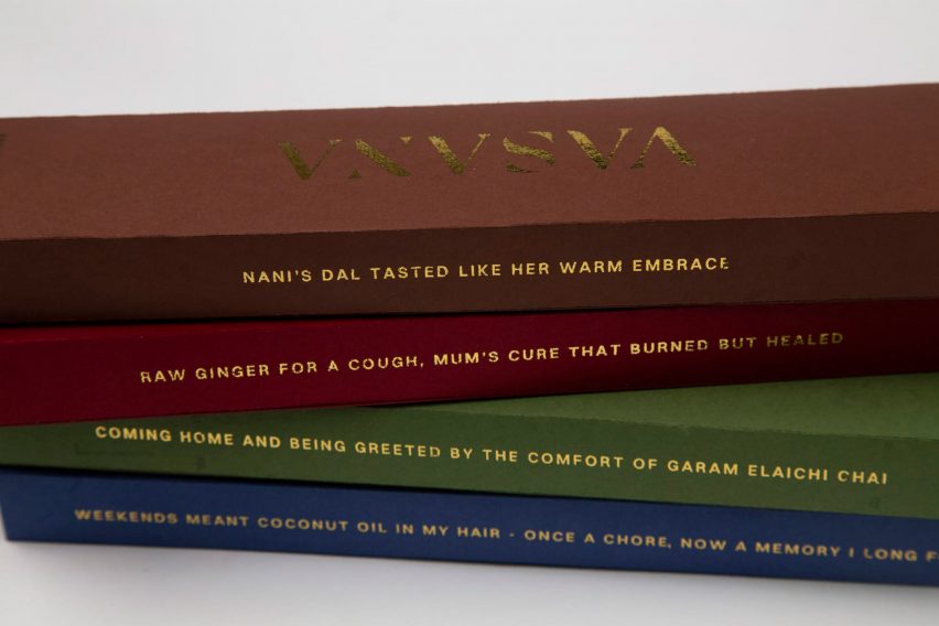 a photograph of a stack of books in tones of brown, red, green and blue