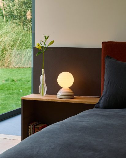 Wake/Sleep light by Heatherwick Studio for Tala in a bedroom