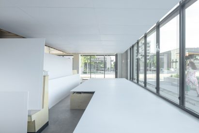 White wall panels in pizza restaurant conversion