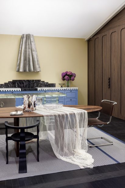 Living room with wooden table and table cloth