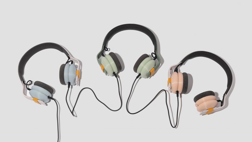 Kibu headphones displayed together in three different colours: blue, green and peach