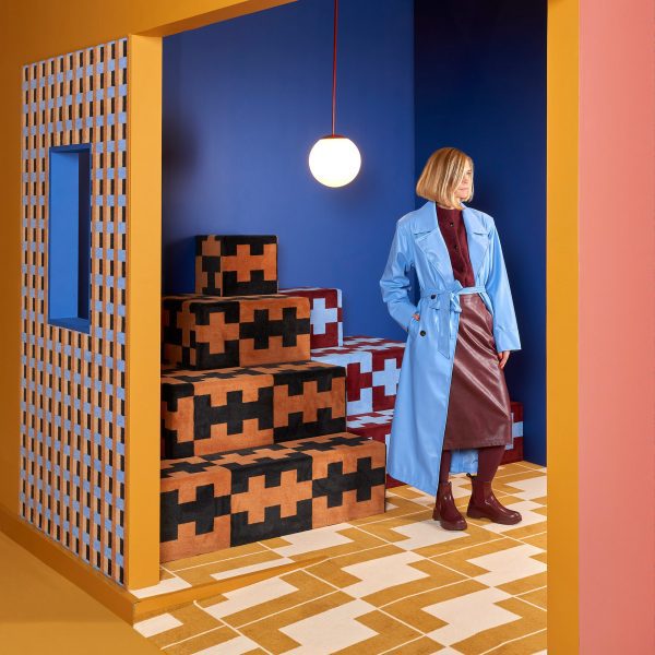 Tekla Evelina Severin is standing on her patterned textile design