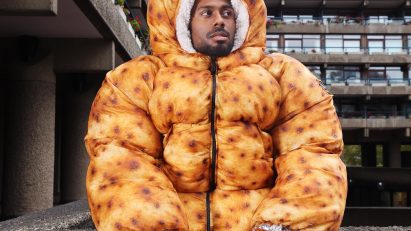 a person wearing a brown puffer coat