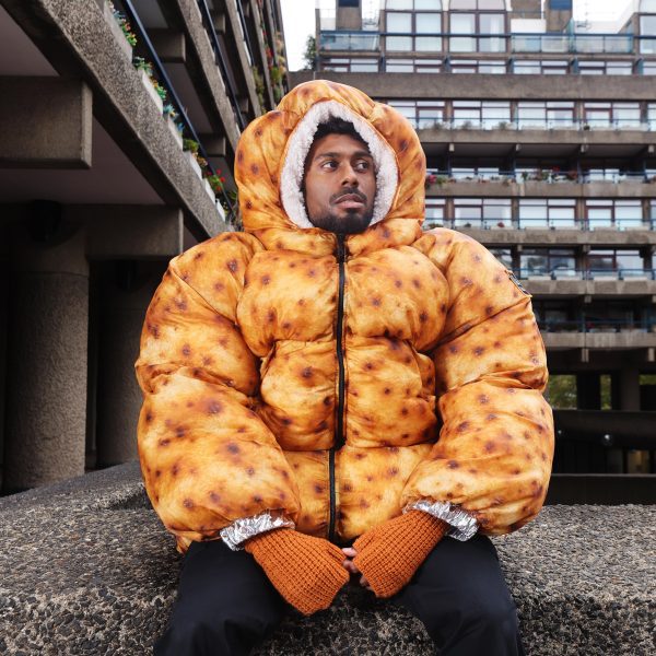a person wearing a brown puffer coat