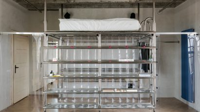 Living space with concrete ceiling and steel frame