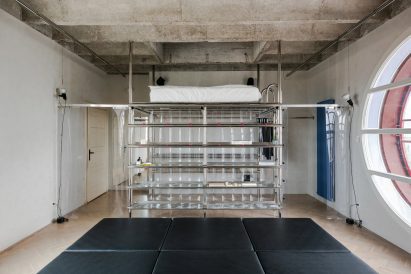 Living space with concrete ceiling and steel frame