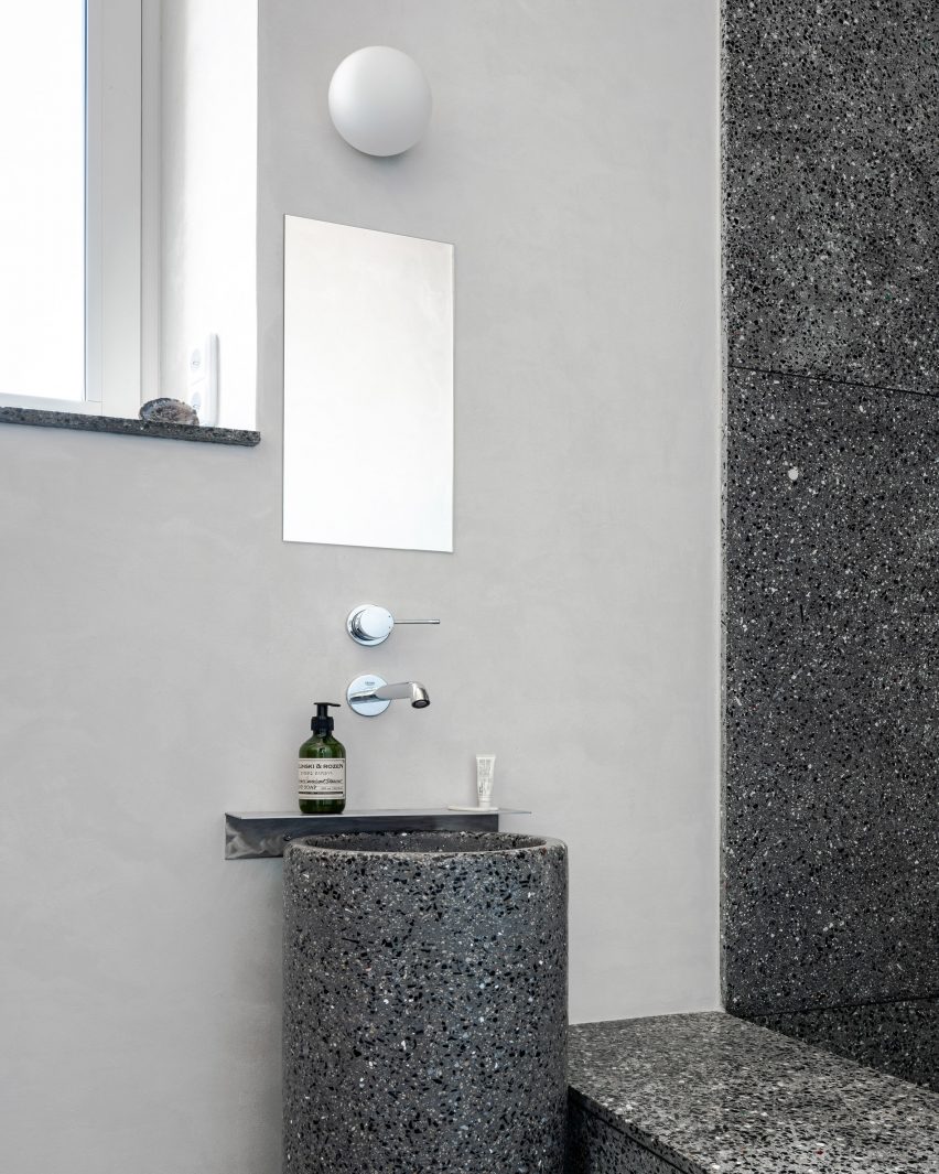 Bathroom lined with recycled plastic terrazzo