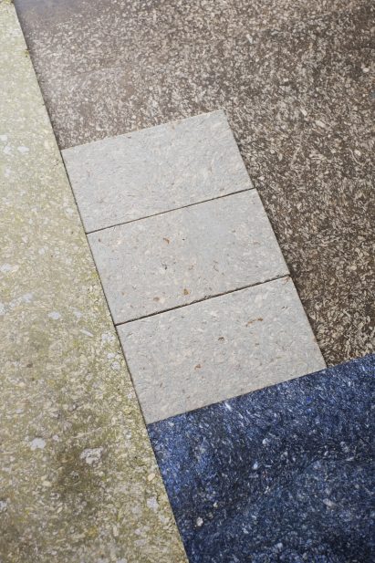 Cupsan material samples in different colour showing a terrazzo-like texture
