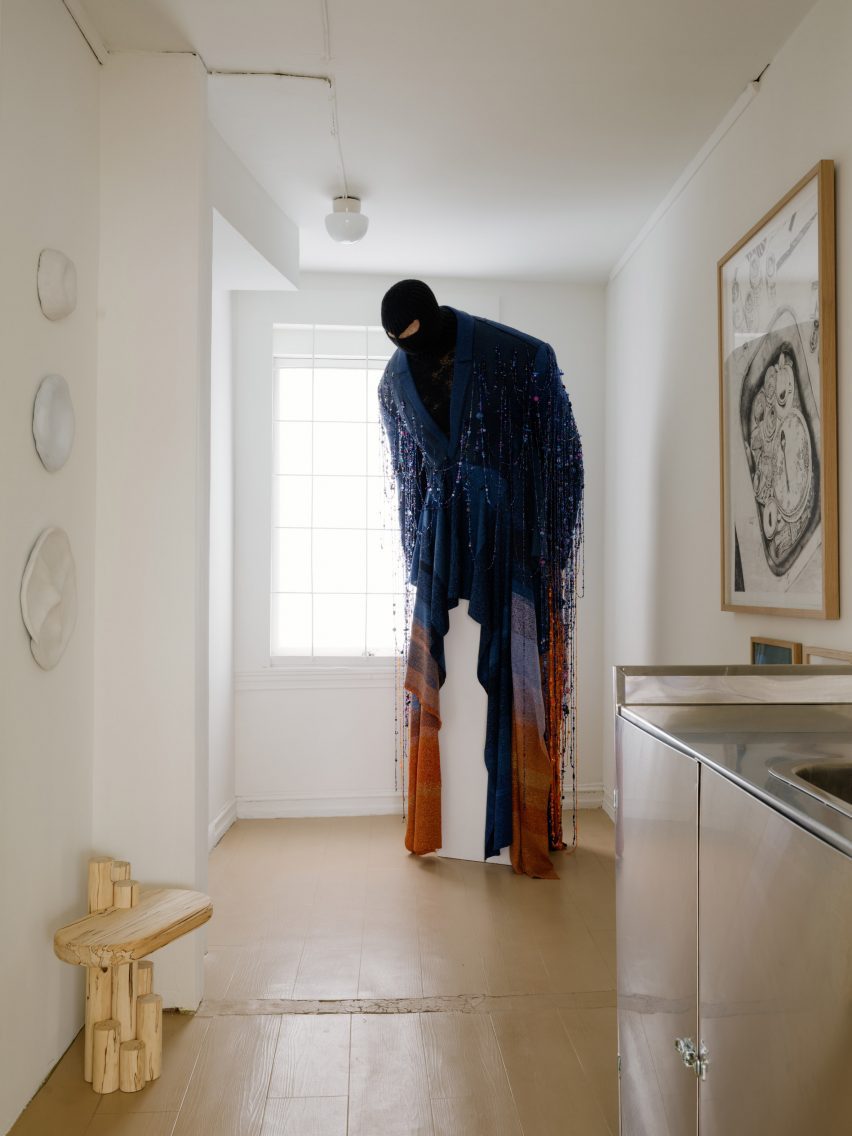 Clothed figure in D142 concept store and galery in Oslo