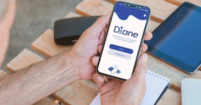 a person holding a smartphone with a healthcare app open on it