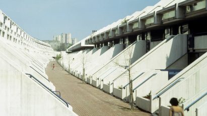 Person walking along Alexandra Road Estate in London
