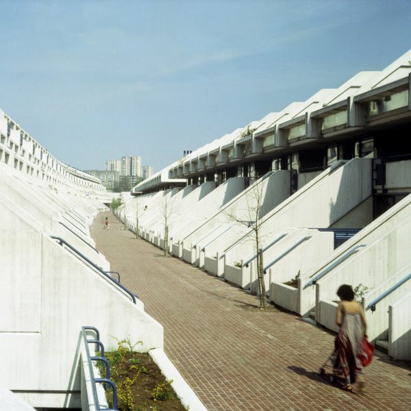 Person walking along Alexandra Road Estate in London