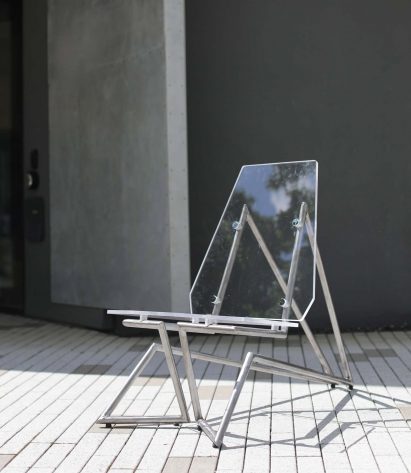 a photograph of a clear acrylic chair