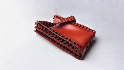 a photograph of a red leather handbag