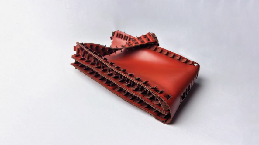a photograph of a red leather handbag