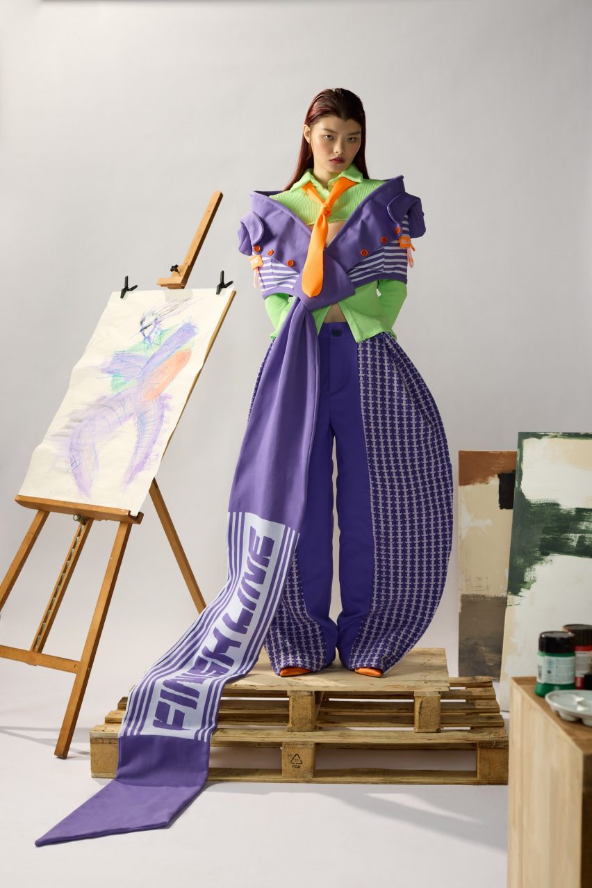 a photograph of a person in a purple garment