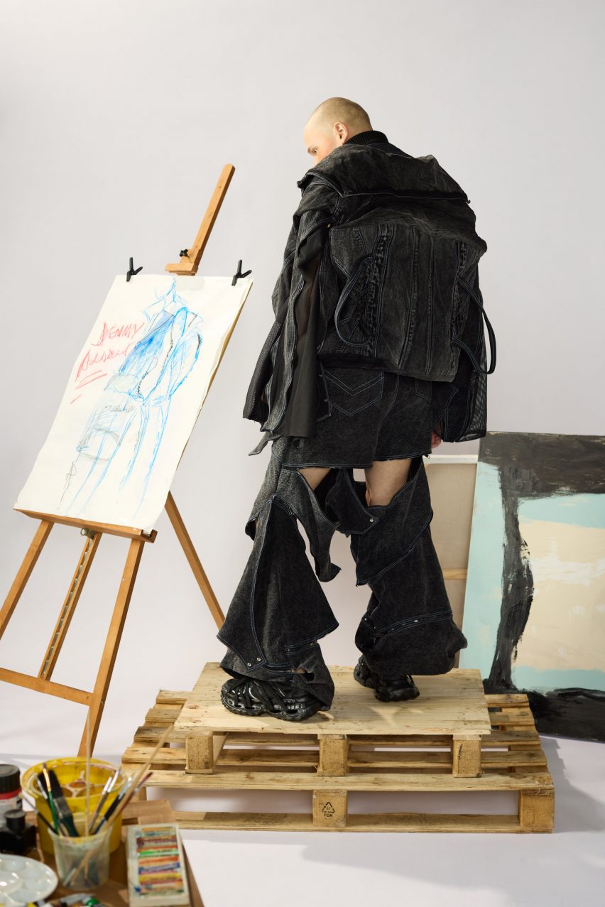 a photograph of a person in black garments