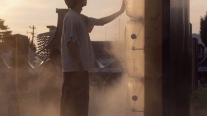Man touching misty wall