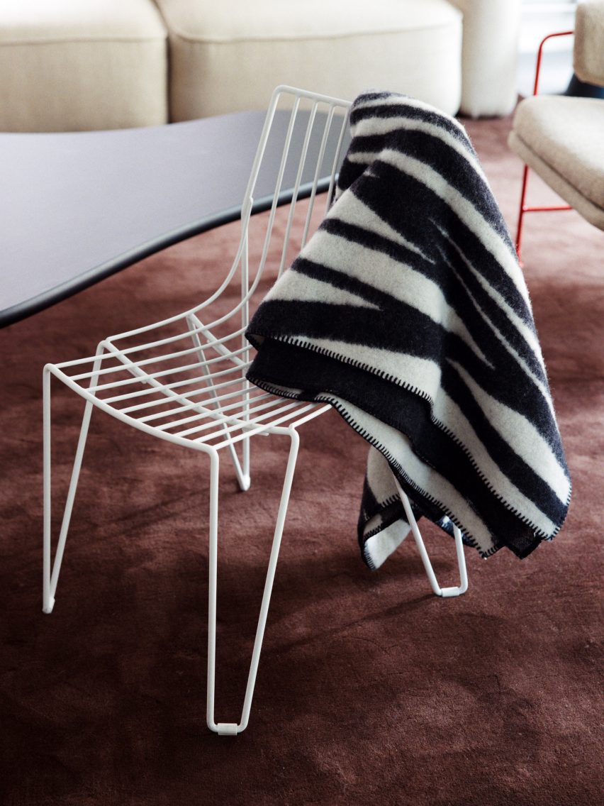 Black-and-white blanket on white chair