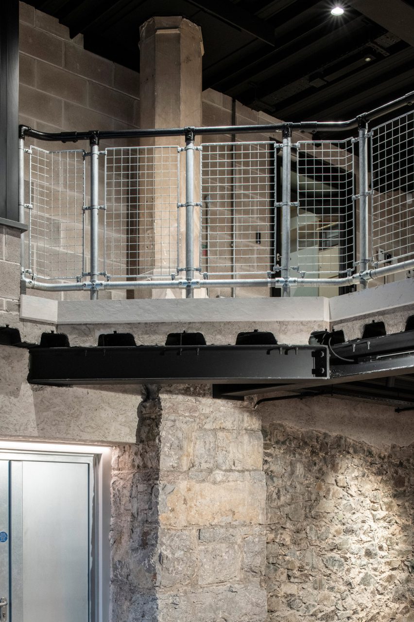 Stone wall and metal railings