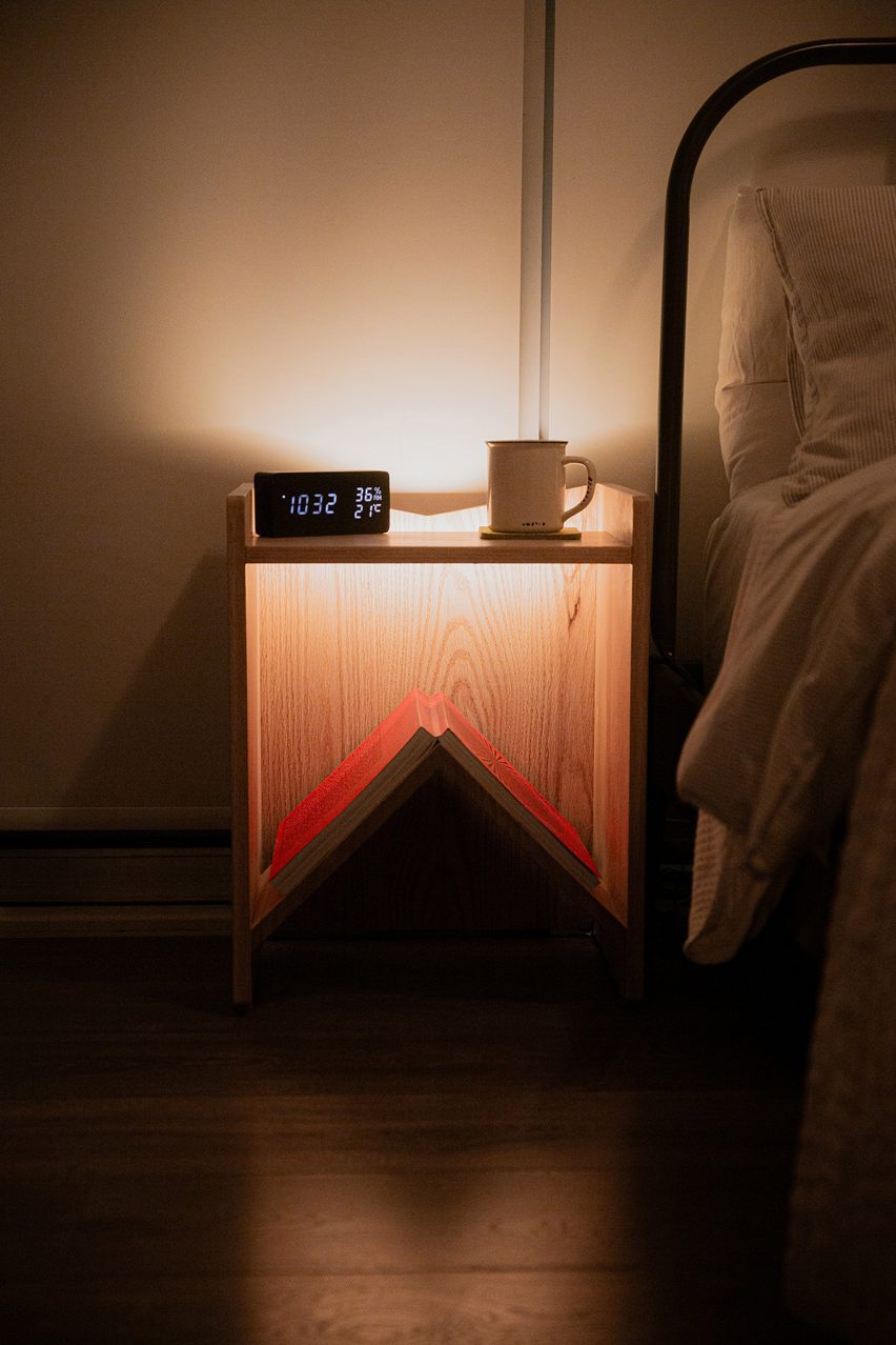 a photograph of a bedside table