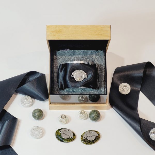 a photograph of a box with jewellery 