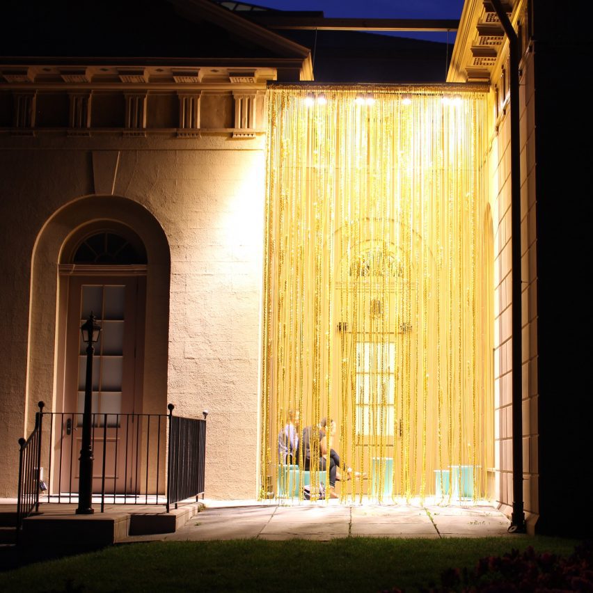 an installation on a building in tones of gold