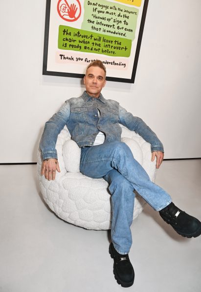 Robbie Williams in The Introvert Chair for Moooi