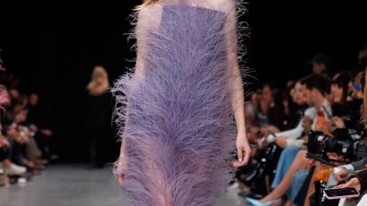 Plant-based Fevvers feathers on a dress in the Stella McCartney Spring/Summer26 show at Paris Fashion Week