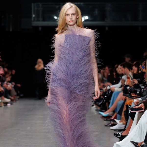 Plant-based Fevvers feathers on a dress in the Stella McCartney Spring/Summer26 show at Paris Fashion Week